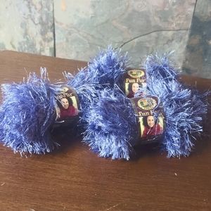 Lot of 3 skeins lion brand fun fur yarn.